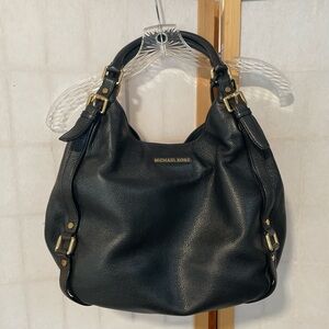 Michael Kors Black Hobo Bag with Gold Accents